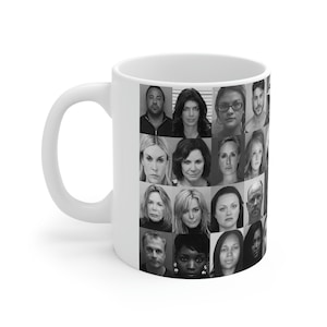 May include: A white ceramic mug featuring a black and white photograph of 25 faces printed on it. The faces are arranged in a grid pattern.