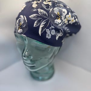 Flowers on Dark Blue Women’s Scrub Cap