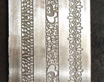 Placa texturizada de acero para la fabricación de joyas / Laminadora y prensa hidráulica