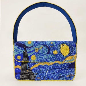 May include: A beaded handbag featuring a design inspired by Van Gogh's "Starry Night." The bag has a blue background with yellow and white accents, a black tree, and a blue handle. The edges are trimmed with yellow beads.