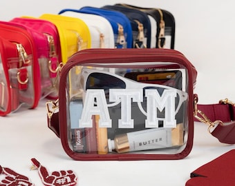 Bolsa transversal transparente personalizada para estádio, bolsa transparente personalizada para shows, bolsa transparente personalizada com patch para estádio, bolsa transparente personalizada para estádio com alça.