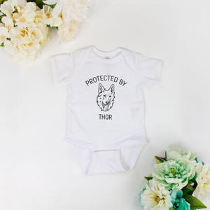 Protected By Pet Name Onsies, Protected By Pet Dog Infant Bodysuit, Custom Baby Shower Onsie Gifts, Personalized New Baby Announcement Onsie