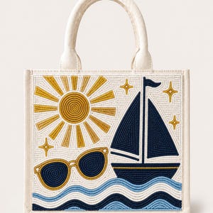 May include: A square off-white canvas tote bag with two top handles. The front features a beaded design of a yellow sun, a dark blue sailboat, dark blue sunglasses, and light blue and dark blue wavy lines representing water against a white background.