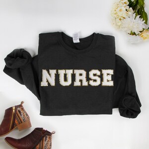 thumbnail image 2 of Nurse GIF - Nurse - Discover & Share GIFs 2 of 11