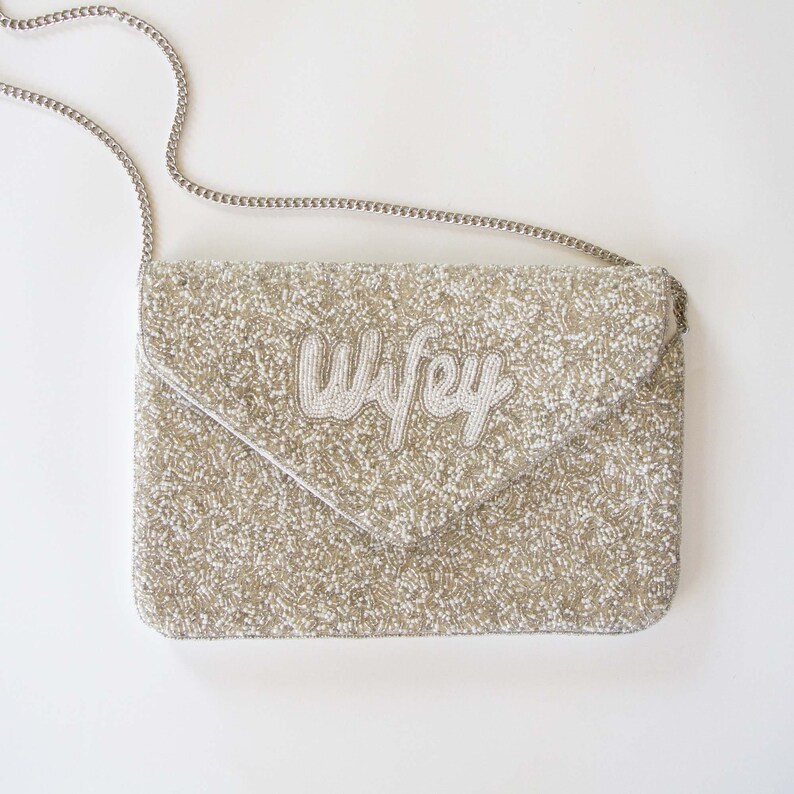 a purse with a name on it sitting on a table
