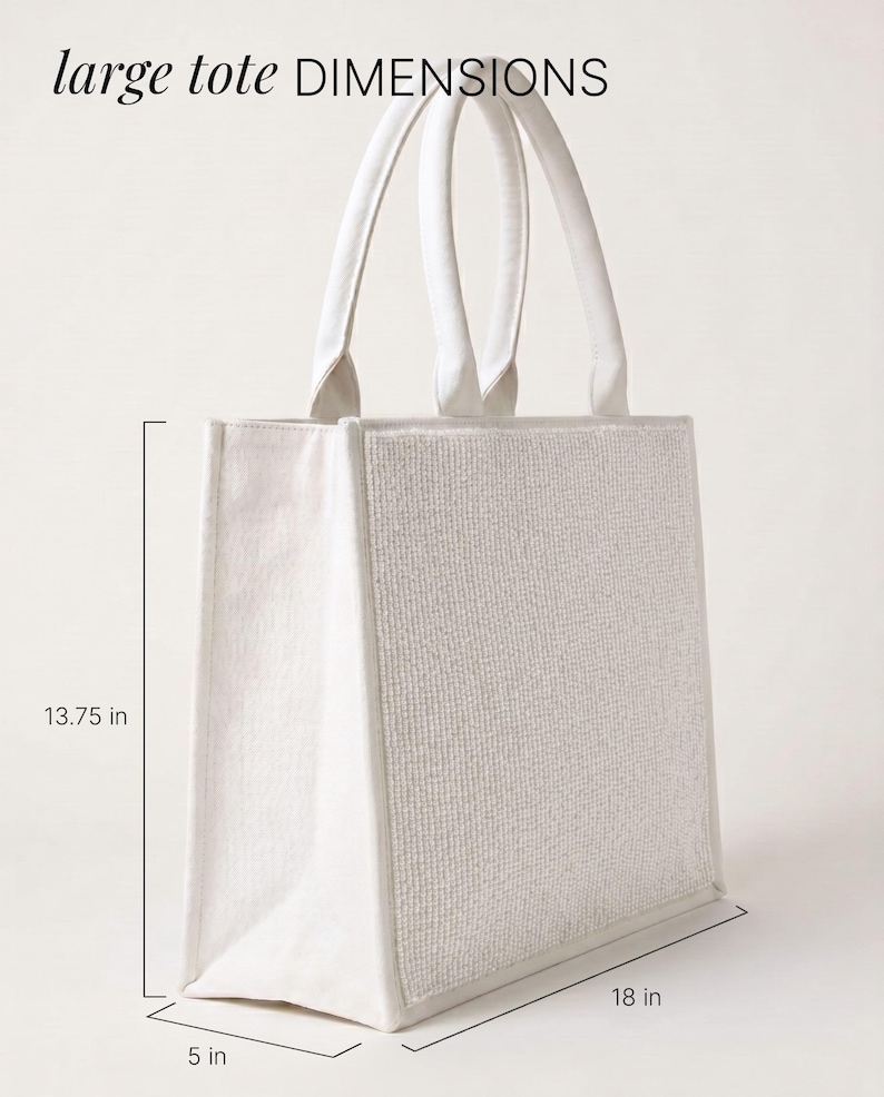 A large white tote bag with measurements provided.