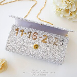 a white purse sitting on top of a table