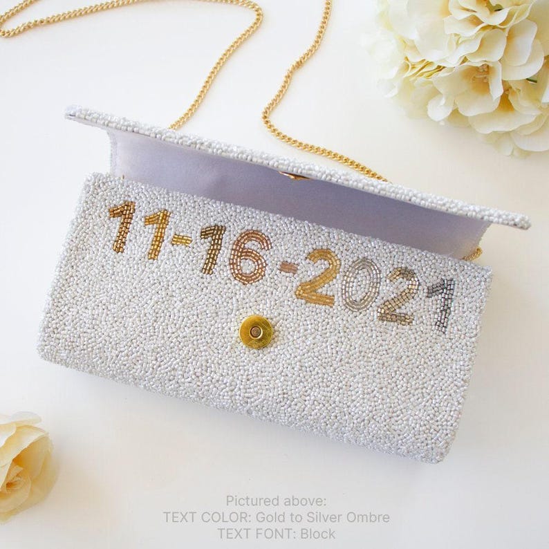 a white purse sitting on top of a table