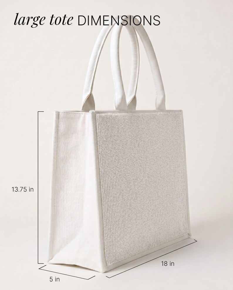 A large white tote bag with measurements provided.
