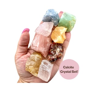 May include: A set of ten raw calcite crystals in various colors, including pink, orange, green, blue, and white. The crystals are arranged in a hand, with the text "Calcite Crystal Set!" in a pink circle.
