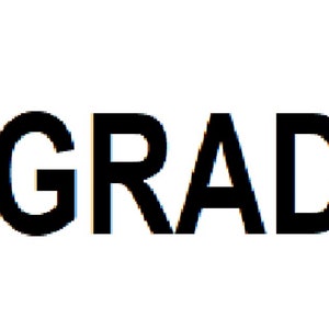 May include: Black and white text that reads "UPGRADE".