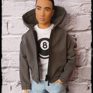 Stylish zip-up olive green jacket for 12” male dolls – perfect streetwear look for your male dolls. Handmade with attention to details.