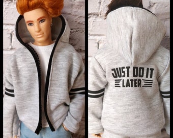 Open hoodie for 12" doll. Spring/autumn light jacket, gray with black stripes and writing "Just do it later". Made on order.