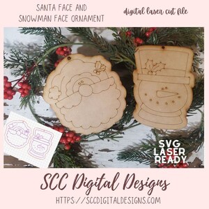 May include: Two unfinished wooden ornaments, one shaped like a Santa face and the other like a snowman face. The ornaments are ready to be painted and decorated. The text "digital laser cut file" and "SVG LASER READY" is visible in the image.