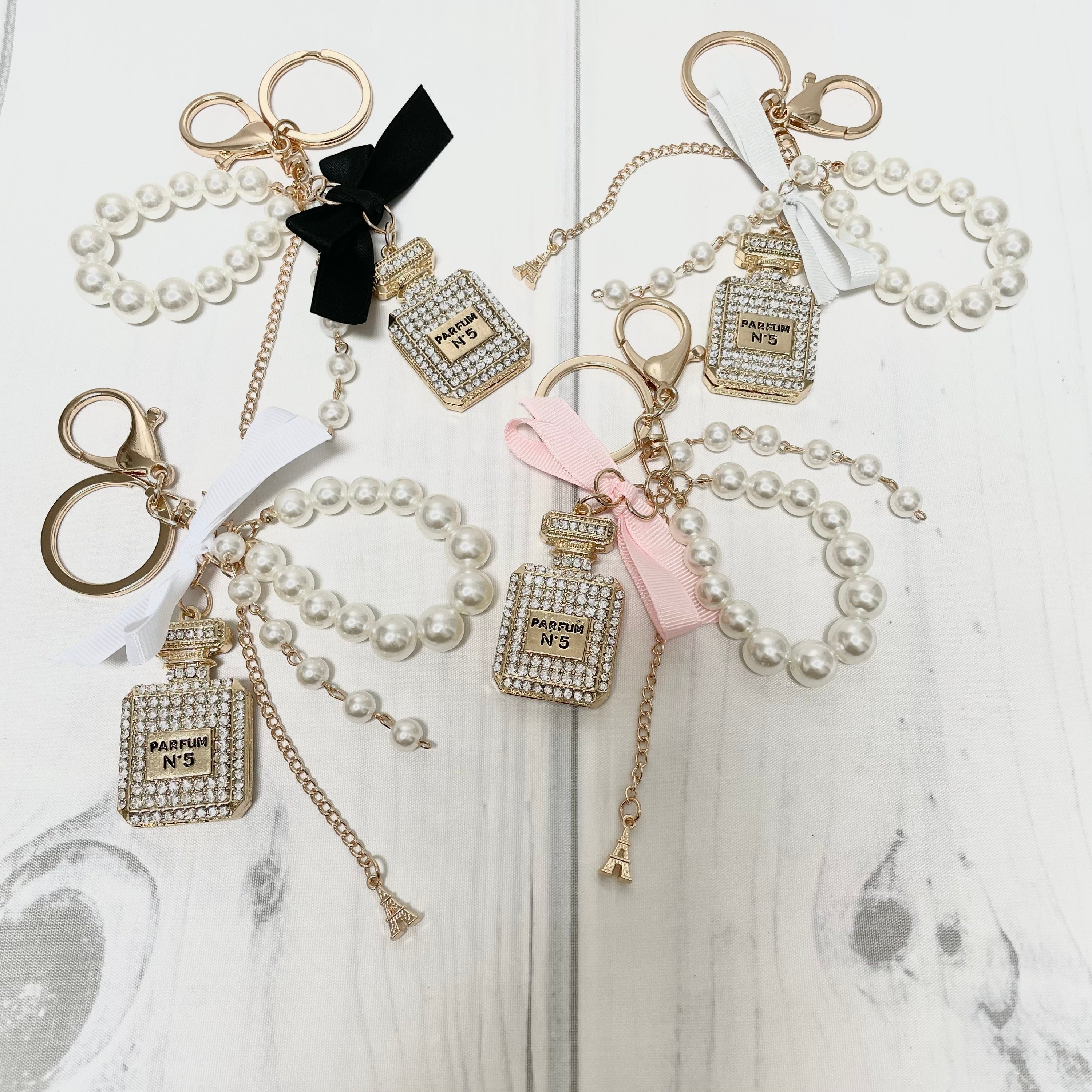 Perfume Bottle With Pink Bow and Pink Crystals Keyring – Gracies Boutique