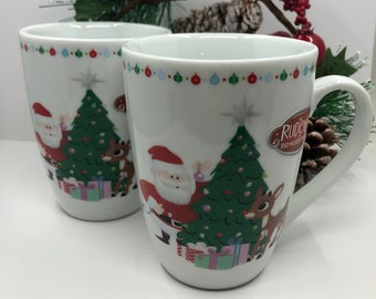 Set of 2 Rudolph The Red Nosed Reindeer with Santa Christmas Mugs Brand New