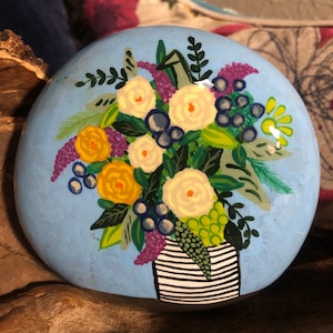 Beautiful floral arrangement in a vase hand painted rock sealed in resin unique gift idea