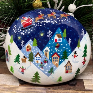 Beautiful Christmas Scene with Skiing Snow and Santa hand painted rock unique gift idea
