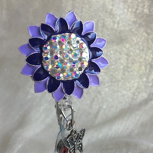Purple metal flower badge holder
