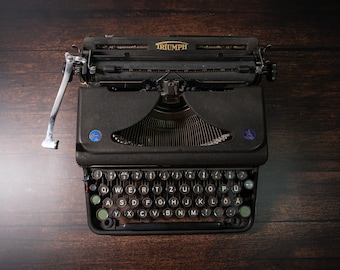 working typewriter Triumph in black from 1948 for mother's day and as birthday and wedding gift