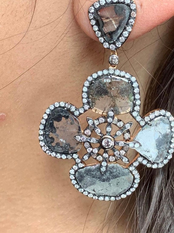18 karat rose gold round and slice diamond earring