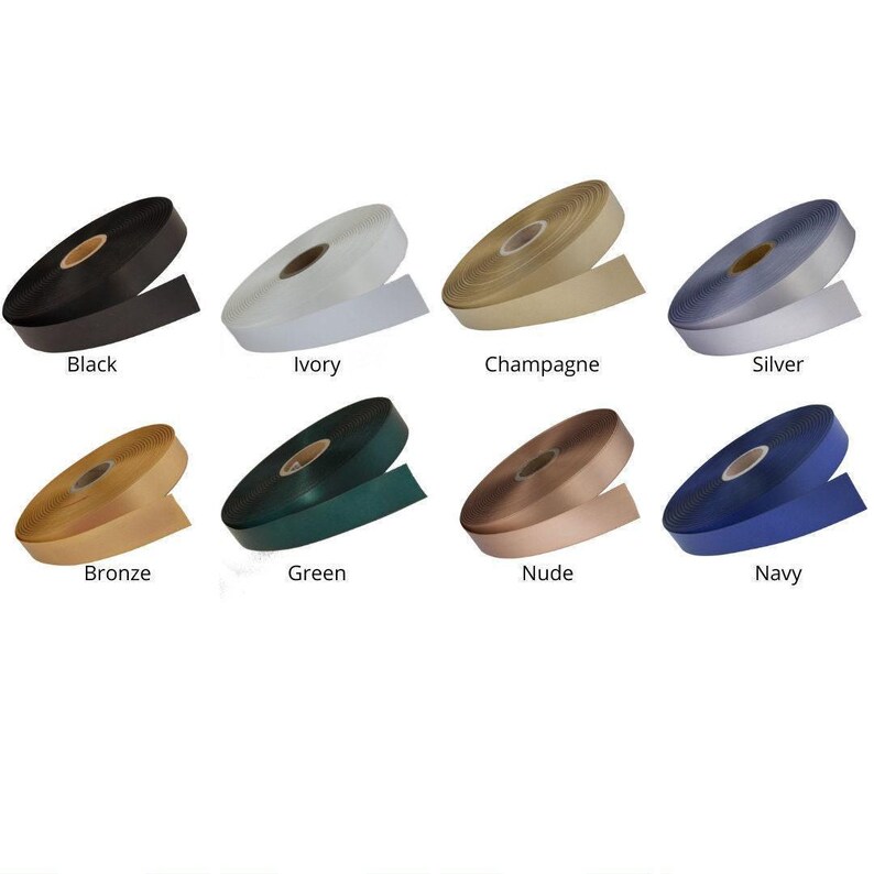 a collection of eight different colored ribbons, each with a label indicating its color.