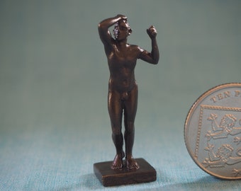 Desnudo masculino en miniatura de bronce, según Rodin