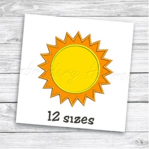May include: A yellow sun with orange rays, a simple design for embroidery. The image text says "12 sizes".