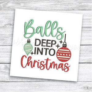 May include: A green and red Christmas ornament embroidery design with the text "Balls Deep Into Christmas".