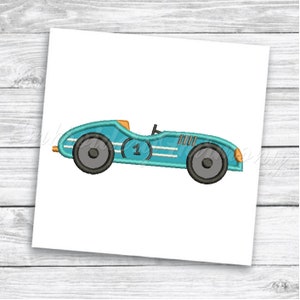 May include: A blue vintage race car with a white stripe and the number "1" on the side. The car has black wheels and orange accents.