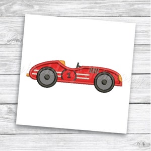 May include: Red race car with a white stripe and the number 1 on the side. The car has black wheels and a yellow windshield.