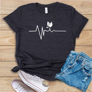 Camiseta vegana Heartbeat: Impulsada por plantas - Camiseta para amantes de los animales