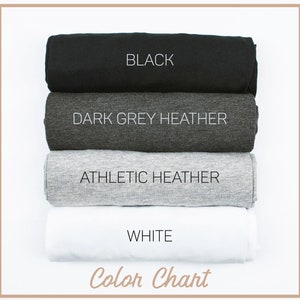 May include: Color chart showing four t-shirt colors: black, dark grey heather, athletic heather, and white.
