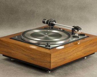 DUAL 1218 turntable - from the early 1970s. Fully functional, in a unique wooden plinth, finished with natural American walnut veneer.