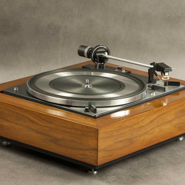 DUAL 1218 turntable - from the early 1970s. Fully functional, in a unique wooden plinth, finished with natural American walnut veneer.