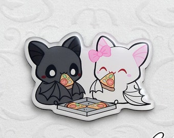 Cuddly bats eating pizza fridge magnet