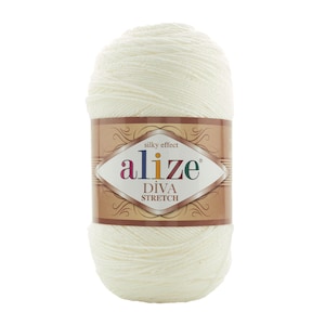 Puede incluir: Una madeja de hilo blanco con una etiqueta que dice "alize silky effect DIVA STRETCH"