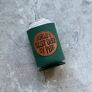 May include: Green can cooler with a brown leather patch that says "World's Best Dad By Par"