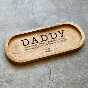 May include: Wooden tray with the text "DADDY Empty your pockets. I can't wait to play! You coming home is the best part of my day. Love, Benny" engraved on it.
