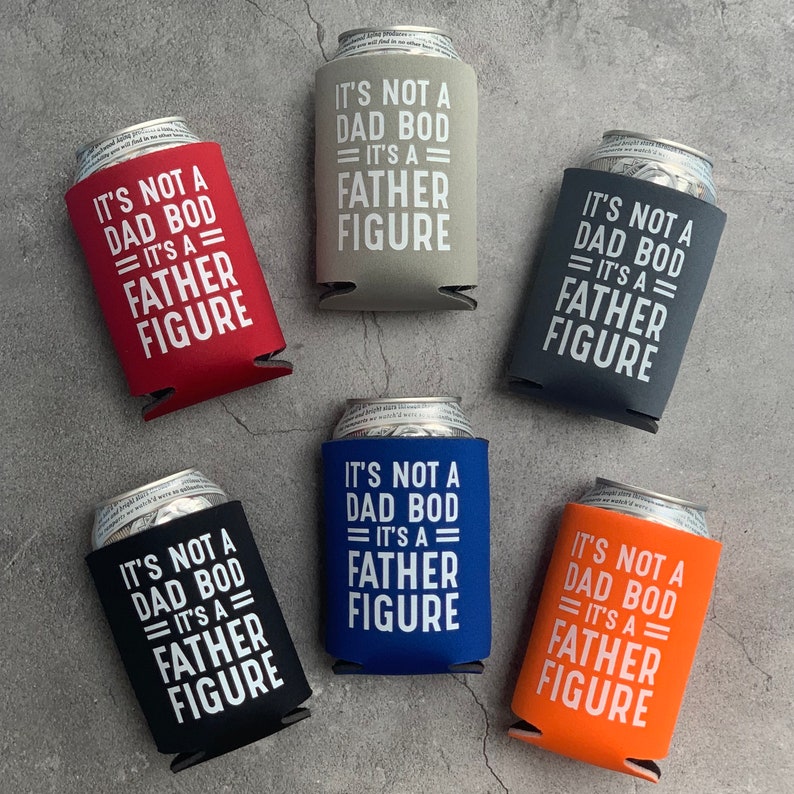 May include: Six different coloured can coolers with the text "It's not a dad bod = It's a father figure" printed in white on each cooler.