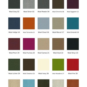 May include: A color chart titled Wool with 47 colors, displaying 25 square fabric swatches in five rows. Each swatch is labeled with a name and number, including Wool Grey 02, Silver 03, Pewter 04, Chinchila 08, Eggplant 12, Indigo 14, Terracotta 15, Cloud 16, Biscuit 17, Emerald 18, Plum 19, Fuchsia 20, Cameo 21, Dust 22, Onyx 23, Lichen 24, Chestnut 25, Ivory 26, Woodbine 27, Fire 28, Calico 29, Turquoise 30, Olive 31, Linen 32, and Rust 33.