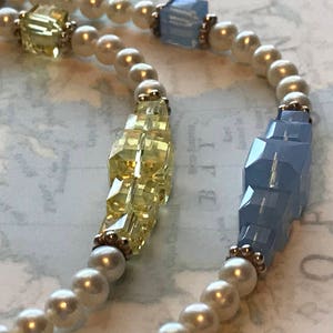 A Fresh Water Pearl Bracelet with Genuine Swarovski Square Crystals