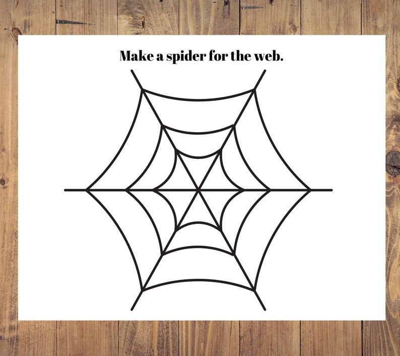 Może przedstawiać: Czarno-biały rysunek pajęczyny. Tekst "Make a spider for the web." znajduje się w g&oacute;rnej części obrazu.