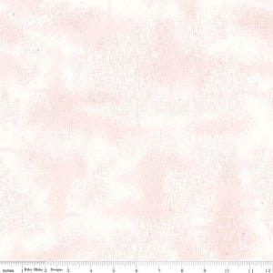 May include: Off-white fabric with a subtle grid pattern and soft pink watercolor-like blotches. The fabric has a textured appearance and is marked with inch measurements along the bottom edge. The text "Riley Blake Designs" is visible.