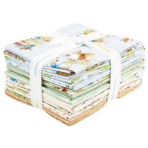 May include: A stack of patterned fabric squares, tied with a white ribbon. The fabric features illustrations of animals and scenes in pastel colors. The ribbon has text printed on it. The fabric is suitable for quilting and crafting projects.