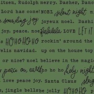 May include: Green fabric with a repeating pattern of Christmas-themed words and phrases in various fonts. Phrases include "Noel", "Silent Night", "Joy", "Peace", and "Santa Claus".