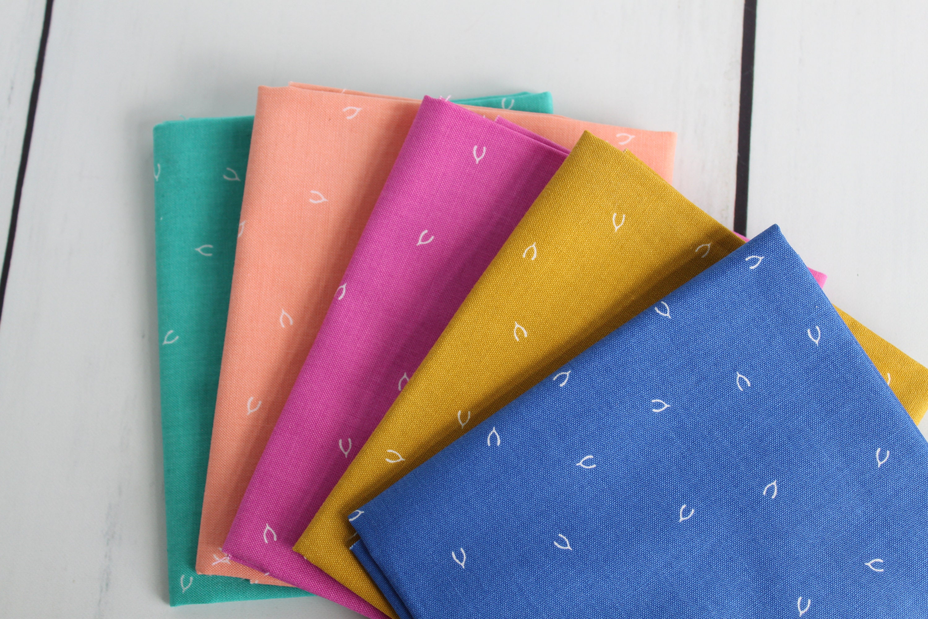 Lucky Charms Wishbone Royal Blue Fabric by Ghazal Razavi for Etsy