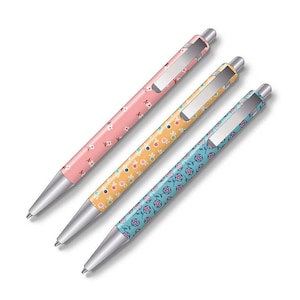 May include: Three pens with floral patterns. The pens are pink, yellow, and blue with white floral designs.