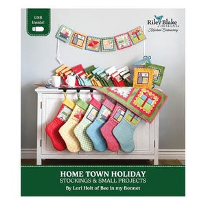 May include: A collection of fabric Christmas stockings and small square quilted projects featuring colorful patterns and house motifs. The set includes a banner of squares, a green quilted runner, and hanging stockings in red, yellow, green, and blue.