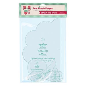 May include: A clear plastic package containing sewing templates. The package features the text "Sew Simple Shapes" and "Strawberry Crush." The templates are light blue and include shapes for a scallop design and a strawberry quilt. Includes 10 templates.